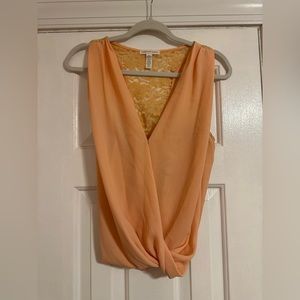 Peach swoop front blouse.
